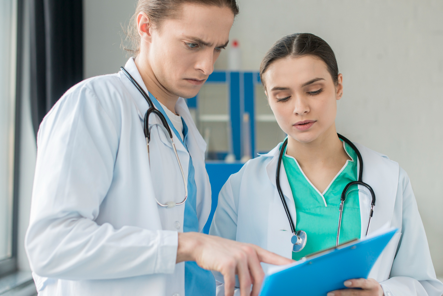 checking heart beat of patient